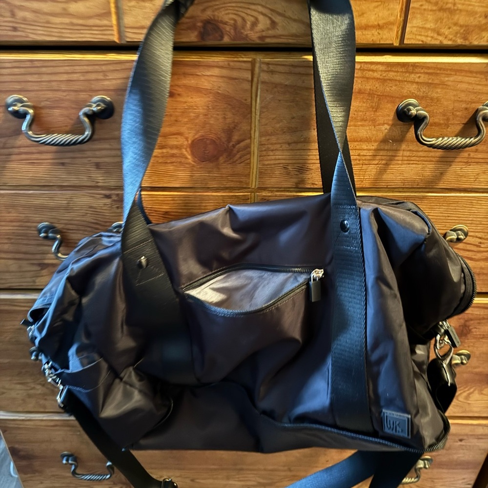 IHKWIP brand black duffle bag with small cosmetic bag.   NWT - Picture 4 of 15